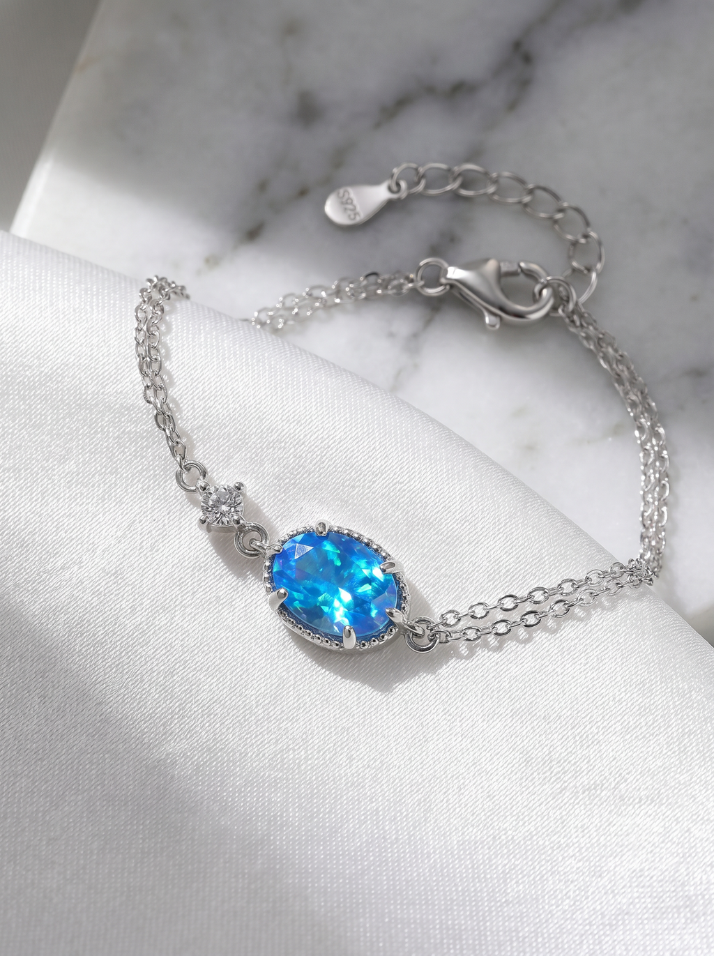 The Serene Aquamarine Oval Halo Bracelet