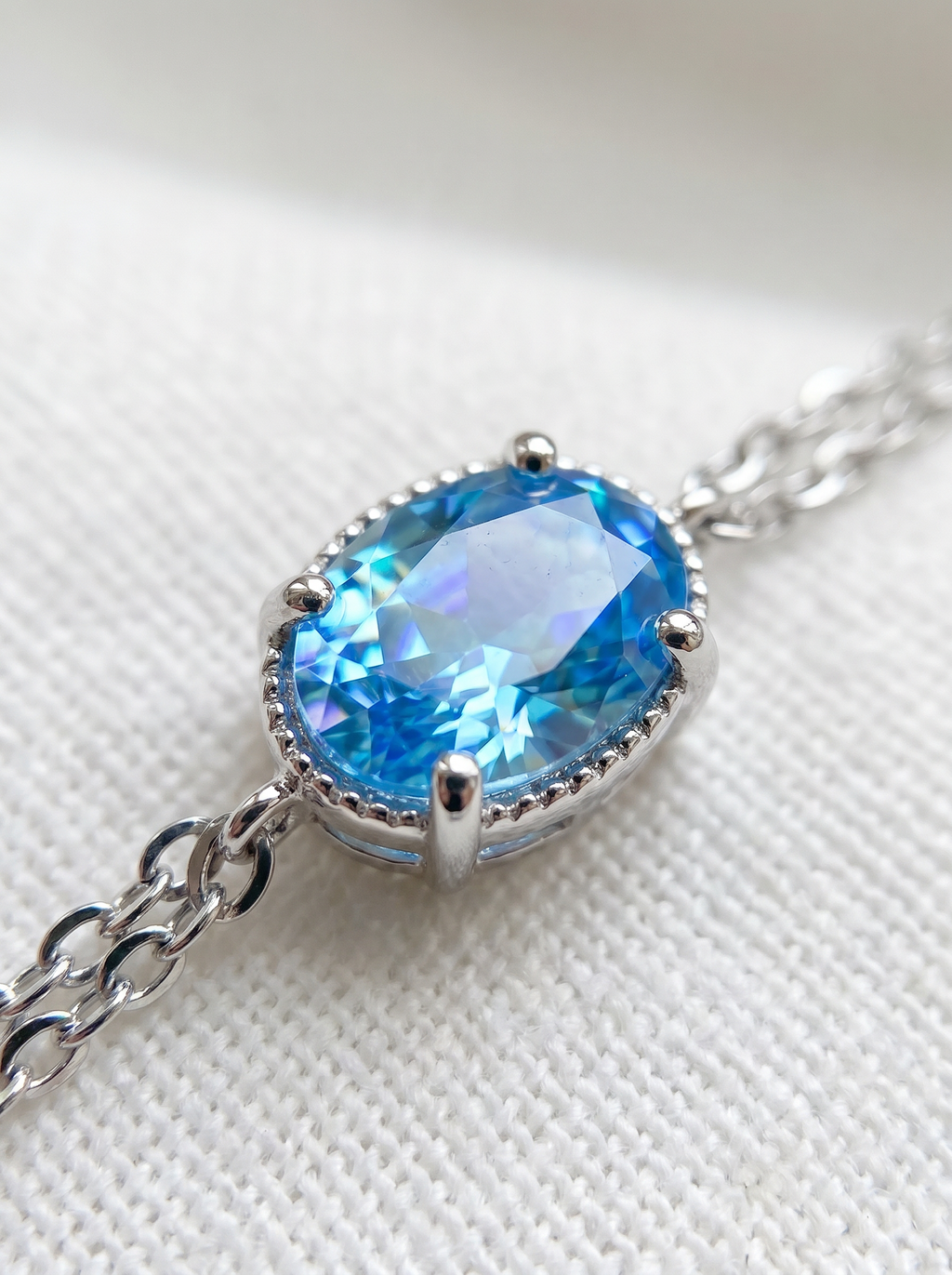 The Serene Aquamarine Oval Halo Bracelet