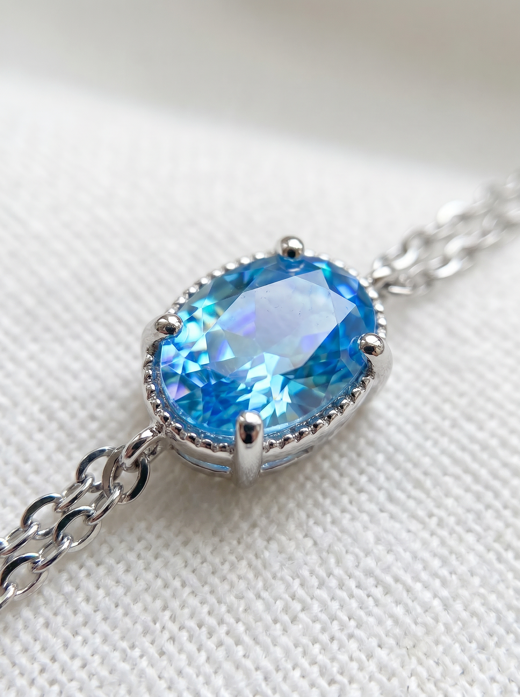 The Serene Aquamarine Oval Halo Bracelet
